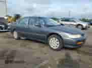 1995 Honda Accord LX z VIN 1HGCD5538SA042335, wystawiony jako Copart lot #65115405 z przebiegiem 272 051 mil mil oraz Szkoda całkowita • Salvage title. Historia ofert i sprzedaży dostępna na DreamBid. Obrazek 4.