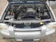 2003 Nissan Frontier XE with VIN 1N6ED29Y83C461767, listed as a Copart auction lot 58077425 with 164,955 mi miles and Salvage title. Bid and sale history available at DreamBid. Image 11.