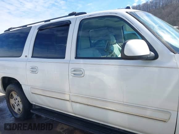 2005 Chevrolet Suburban Z71 with VIN 3GNFK16Z05G283414, listed as a IAAI auction lot 41656483 with 185,501 mi miles and . Bid and sale history available at DreamBid. Image 14.