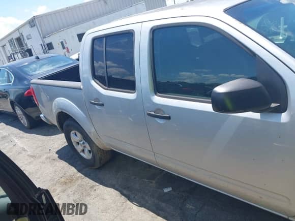 2009 Nissan Frontier SE with VIN 1N6AD07U59C407404, listed as a IAAI auction lot 42772182 with 183,640 mi miles and . Bid and sale history available at DreamBid. Image 13.