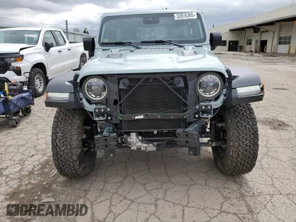 2024 Jeep Wrangler Rubicon with VIN 1C4PJXFG8RW263453, listed as a Copart auction lot 53976365 with 17,779 mi miles and Salvage title. Bid and sale history available at DreamBid. Image 5.
