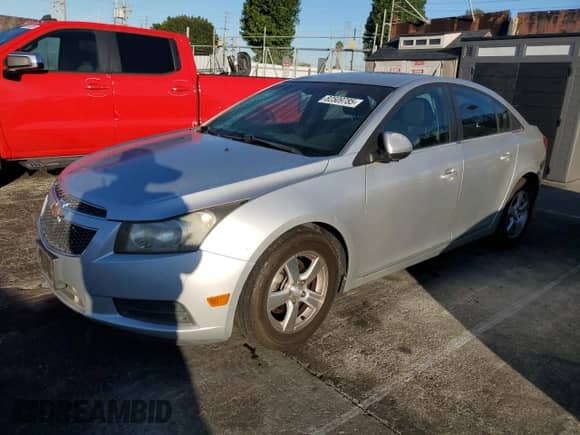 2012 Chevrolet Cruze 1LT with VIN 1G1PF5SC3C7242562, listed as a Copart auction lot 82509785 with 131,244 mi miles and Clean title. Bid and sale history available at DreamBid. Image 1.