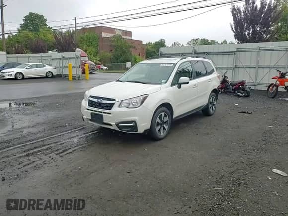 2018 Subaru Forester Premium z VIN JF2SJAEC7JH516178, wystawiony jako Copart lot #83781815 z przebiegiem 77 099 mil mil oraz Szkoda całkowita • Salvage title. Historia ofert i sprzedaży dostępna na DreamBid. Obrazek 13.