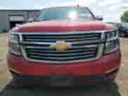 2015 Chevrolet Suburban LTZ with VIN 1GNSKKKC7FR563340, listed as a Copart auction lot 68143455 with 233,737 mi miles and Salvage title. Bid and sale history available at DreamBid. Image 5.