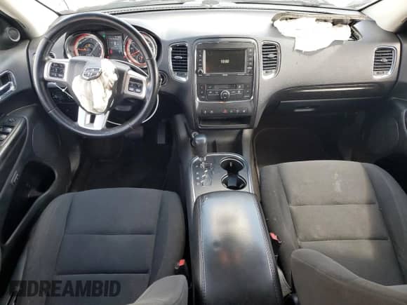 2012 Dodge Durango Crew with VIN 1C4SDJDT0CC112663, listed as a Copart auction lot 56706625 with 162,416 mi miles and Salvage title. Bid and sale history available at DreamBid. Image 8.