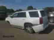 2016 Chevrolet Tahoe LTZ with VIN 1GNSKCKC9GR173198, listed as a Copart auction lot 71734355 with 141,492 mi miles and Salvage title. Bid and sale history available at DreamBid. Image 2.
