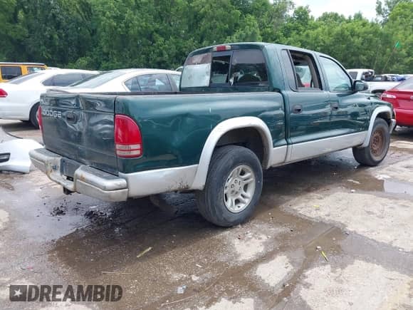 2002 Dodge Dakota SLT with VIN 1B7HL48N72S640361, listed as a IAAI auction lot 42430951 with 197,267 mi miles and . Bid and sale history available at DreamBid. Image 4.