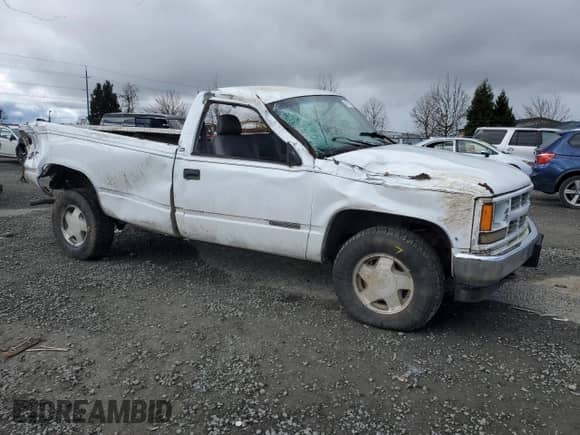 1997 GMC Sierra 1500 with VIN 1GTEK14W5VZ551810, listed as a Copart auction lot 47287015 with 168,113 mi miles and Salvage title. Bid and sale history available at DreamBid. Image 4.