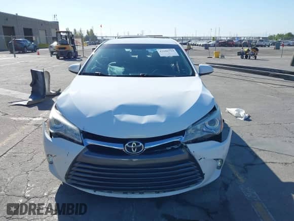 2015 Toyota Camry SE z VIN 4T1BF1FK8FU068002, wystawiony jako IAAI lot #43106714 z przebiegiem 102 717 mil mil oraz . Historia ofert i sprzedaży dostępna na DreamBid. Obrazek 13.