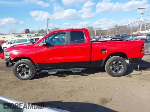 2019 Ram 1500 Rebel with VIN 1C6SRFET5KN753654, listed as a IAAI auction lot 41421884 with 90,255 mi miles and . Bid and sale history available at DreamBid. Image 14.