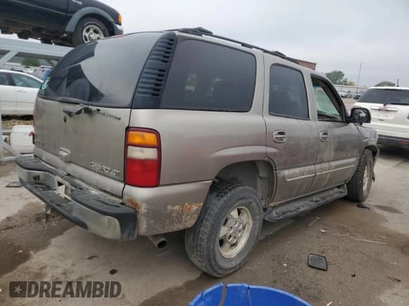 2003 Chevrolet Tahoe LS z VIN 1GNEC13Z53R123325, wystawiony jako Copart lot #81697715 z przebiegiem Nie podano mil oraz Szkoda całkowita • Salvage title. Historia ofert i sprzedaży dostępna na DreamBid. Obrazek 3.