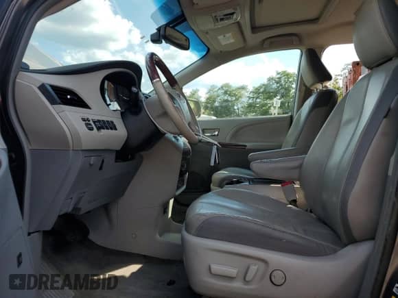 2014 Toyota Sienna Limited с VIN 5TDDK3DC0ES076338, выставлен на аукционе Copart как лот 69873955 с пробегом 183 756 миль миль и Списание • Salvage title. История ставок и продаж доступна на DreamBid. Изображение 7.