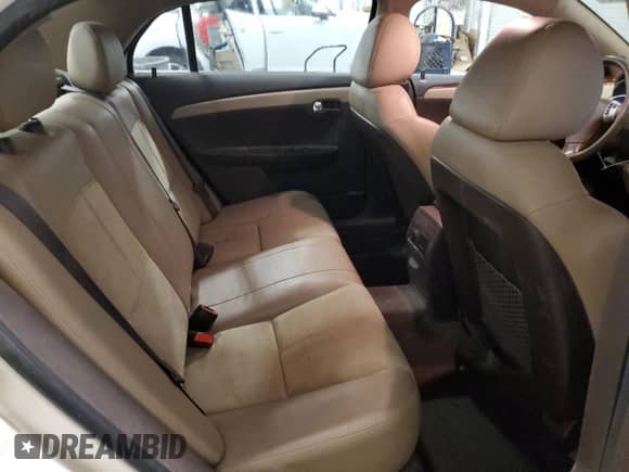 2012 Chevrolet Malibu 3LT z VIN 1G1ZF5E7XCF108029, wystawiony jako Copart lot #62556065 z przebiegiem 100 399 mil mil oraz Szkoda całkowita • Salvage title. Historia ofert i sprzedaży dostępna na DreamBid. Obrazek 11.