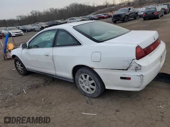 2002 Honda Accord with VIN 1HGCG32242A033235, listed as a Copart auction lot 87837155 with 180,393 mi miles and Salvage title. Bid and sale history available at DreamBid. Image 2.