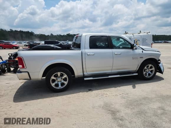 2014 Ram 1500 Laramie with VIN 1C6RR6NT0ES397960, listed as a Copart auction lot 61458895 with 148,298 mi miles and Salvage title. Bid and sale history available at DreamBid. Image 3.
