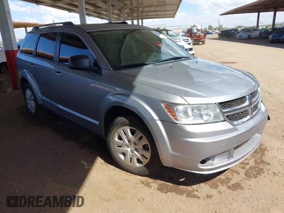 2017 Dodge Journey SE z VIN 3C4PDCAB7HT626826, wystawiony jako IAAI lot #43221740 z przebiegiem 77 842 mil mil oraz . Historia ofert i sprzedaży dostępna na DreamBid. Obrazek 1.