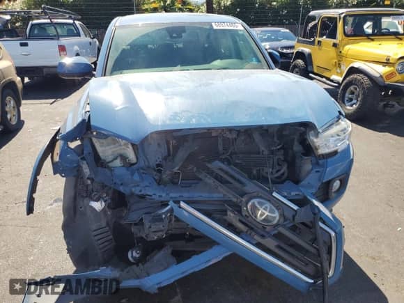 2019 Toyota Tacoma SR with VIN 3TMCZ5AN3KM244008, listed as a Copart auction lot 68974465 with 123,236 mi miles and Salvage title. Bid and sale history available at DreamBid. Image 5.