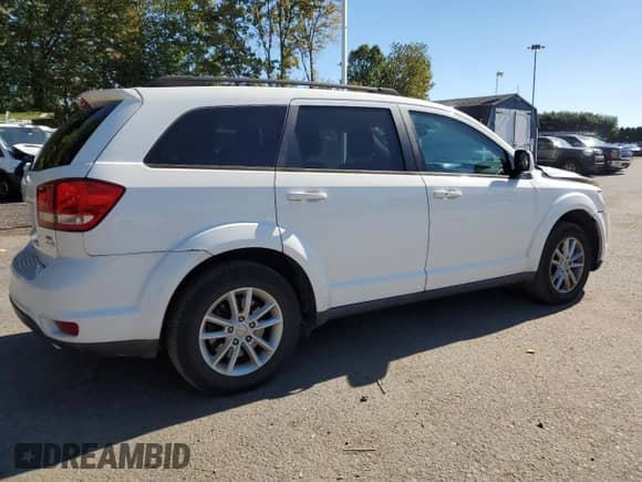 2015 Dodge Journey SXT with VIN 3C4PDDBG3FT613276, listed as a Copart auction lot 85899795 with 151,311 mi miles and Salvage title. Bid and sale history available at DreamBid. Image 3.