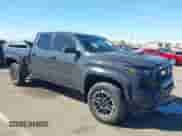 2024 Toyota Tacoma SR5 with VIN 3TMLB5FN8RM005075, listed as a IAAI auction lot 43290415 with 20,318 mi miles and . Bid and sale history available at DreamBid. Image 1.