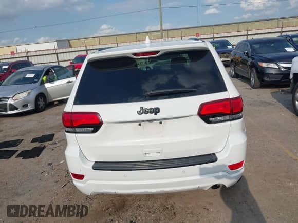 2021 Jeep Grand Cherokee Laredo E with VIN 1C4RJEAG5MC679877, listed as a IAAI auction lot 42367642 with 41,478 mi miles and . Bid and sale history available at DreamBid. Image 16.