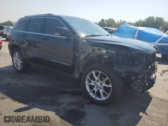 2016 Jeep Grand Cherokee Summit with VIN 1C4RJFJG6GC349482, listed as a Copart auction lot 64994085 with 125,457 mi miles and Salvage title. Bid and sale history available at DreamBid. Image 4.