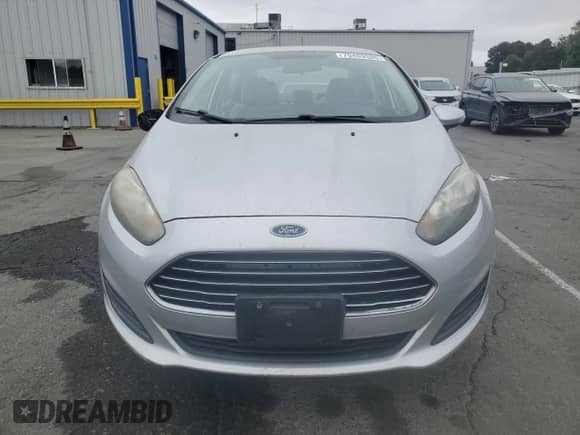 2015 Ford Fiesta SE z VIN 3FADP4BJ1FM164167, wystawiony jako Copart lot #70409585 z przebiegiem 192 708 mil mil oraz Czysty tytuł • Clean title. Historia ofert i sprzedaży dostępna na DreamBid. Obrazek 5.
