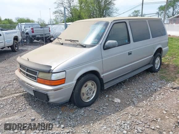 1991 Dodge Grand Caravan with VIN 1B4GK54R6MX632977, listed as a IAAI auction lot 42063934 with 130,812 mi miles and . Bid and sale history available at DreamBid. Image 2.