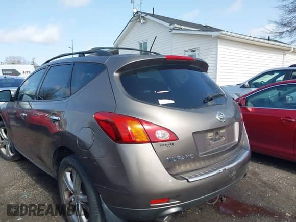 2009 Nissan Murano SL with VIN JN8AZ18U69W023062, listed as a IAAI auction lot 41732136 with 182,292 mi miles and . Bid and sale history available at DreamBid. Image 3.