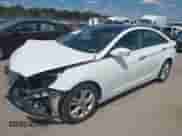 2013 Hyundai Sonata SE with VIN 5NPEC4ACXDH721965, listed as a IAAI auction lot 43201300 with 58,467 mi miles and . Bid and sale history available at DreamBid. Image 2.