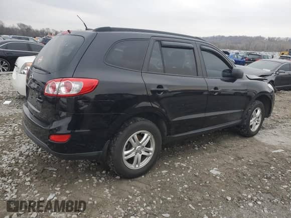 2012 Hyundai Santa Fe GLS с VIN 5XYZG4AG8CG151172, выставлен на аукционе Copart как лот 78163754 с пробегом 105 444 миль миль и Списание • Salvage title. История ставок и продаж доступна на DreamBid. Изображение 3.