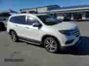 2017 Honda Pilot Elite with VIN 5FNYF6H08HB028022, listed as a Copart auction lot 84253805 with 109,347 mi miles and Salvage title. Bid and sale history available at DreamBid. Image 4.