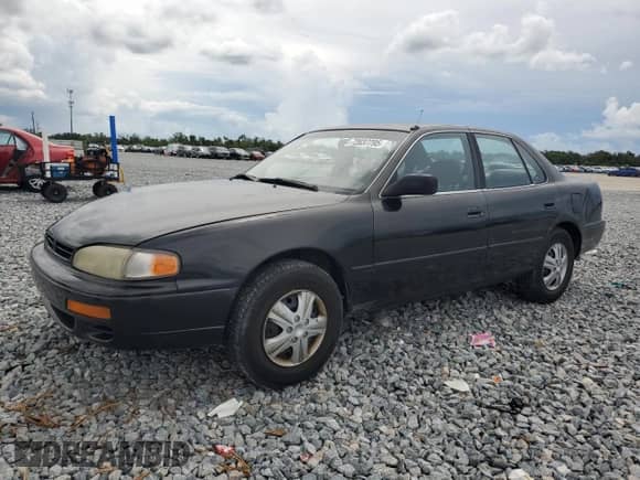 1996 Toyota Camry DX z VIN 4T1BG12K7TU811280, wystawiony jako Copart lot #72037795 z przebiegiem 110 064 mil mil oraz Szkoda całkowita • Salvage title. Historia ofert i sprzedaży dostępna na DreamBid. Obrazek 1.