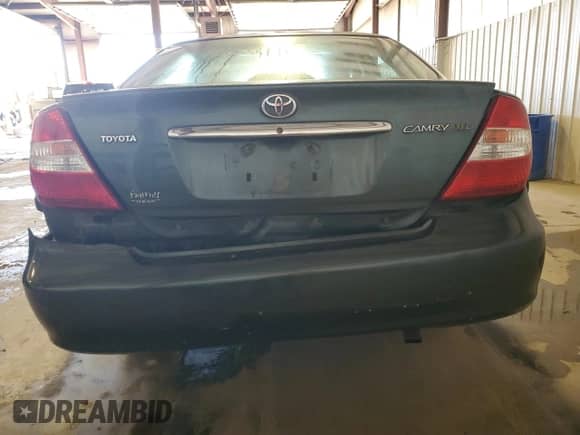 2003 Toyota Camry XLE с VIN 4T1BE30K43U704577, выставлен на аукционе Copart как лот 87444445 с пробегом 205 977 миль миль и Списание • Salvage title. История ставок и продаж доступна на DreamBid. Изображение 6.