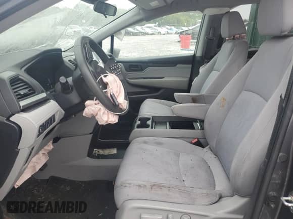 2018 Honda Odyssey EX z VIN 5FNRL6H52JB073911, wystawiony jako Copart lot #70838015 z przebiegiem Nie podano mil oraz Szkoda całkowita • Salvage title. Historia ofert i sprzedaży dostępna na DreamBid. Obrazek 7.