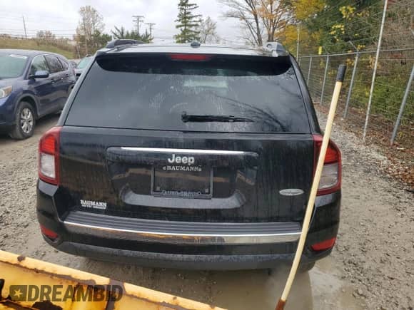 2014 Jeep Compass Latitude with VIN 1C4NJCEA5ED732288, listed as a Copart auction lot 82689185 with 102,856 mi miles and Clean title. Bid and sale history available at DreamBid. Image 6.