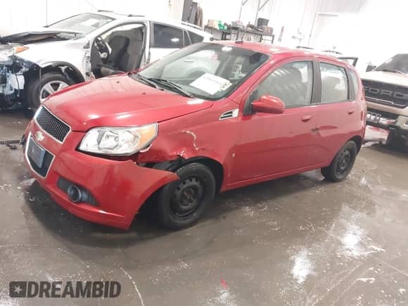 2009 Chevrolet Aveo 1LT z VIN KL1TD66E89B615900, wystawiony jako IAAI lot #42061164 z przebiegiem 117 724 mil mil oraz . Historia ofert i sprzedaży dostępna na DreamBid. Obrazek 2.