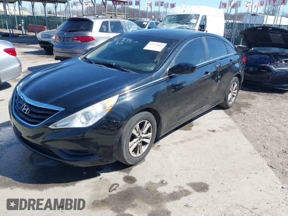 2012 Hyundai Sonata GLS with VIN 5NPEB4AC5CH383232, listed as a IAAI auction lot 41779644 with 148,375 mi miles and . Bid and sale history available at DreamBid. Image 2.