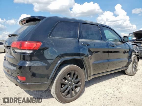 2018 Jeep Grand Cherokee Altitude with VIN 1C4RJFAG3JC235902, listed as a Copart auction lot 85652635 with 68,150 mi miles and Salvage title. Bid and sale history available at DreamBid. Image 3.