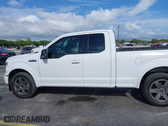 2020 Ford F-150 XL with VIN 1FTEX1CP4LKE56026, listed as a IAAI auction lot 41196057 with 92,828 mi miles and . Bid and sale history available at DreamBid. Image 14.