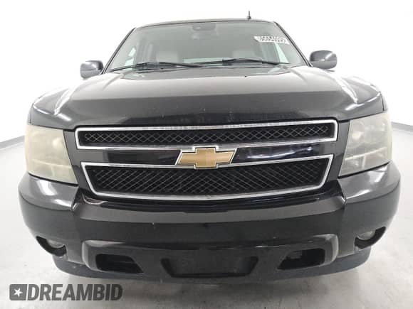 2007 Chevrolet Suburban LTZ z VIN 3GNFC16Y17G299614, wystawiony jako Copart lot #85654095 z przebiegiem 157 767 mil mil oraz Czysty tytuł • Clean title. Historia ofert i sprzedaży dostępna na DreamBid. Obrazek 5.