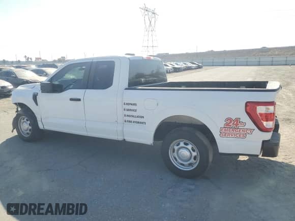 2022 Ford F-150 XL with VIN 1FTEX1CP3NKE58532, listed as a Copart auction lot 70737435 with 95,811 mi miles and Salvage title. Bid and sale history available at DreamBid. Image 2.