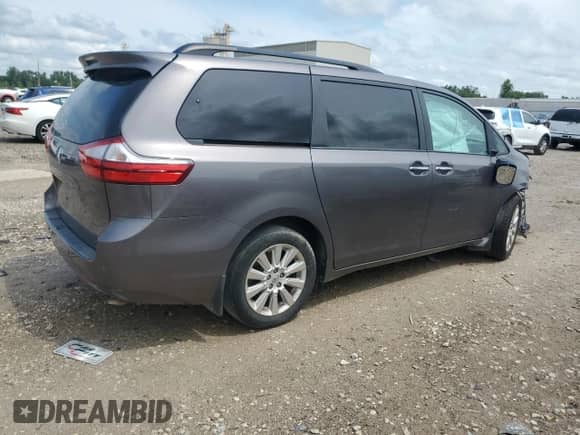 2015 Toyota Sienna Limited with VIN 5TDDK3DC4FS098702, listed as a Copart auction lot 68419765 with Not provided miles and Salvage title. Bid and sale history available at DreamBid. Image 3.