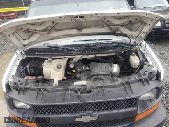 2003 Chevrolet Express Cargo с VIN 1GCGG25U831126705, выставлен на аукционе Copart как лот 73466744 с пробегом 265 323 миль миль и Списание • Salvage title. История ставок и продаж доступна на DreamBid. Изображение 13.