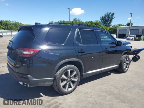 2023 Honda Pilot Elite с VIN 5FNYG1H88PB025254, выставлен на аукционе Copart как лот 84804475 с пробегом 32 604 миль миль и Списание • Salvage title. История ставок и продаж доступна на DreamBid. Изображение 3.