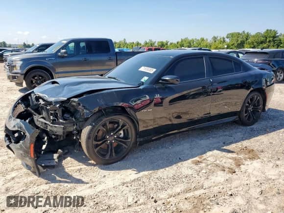 2022 Dodge Charger R/T с VIN 2C3CDXCT6NH235641, выставлен на аукционе Copart как лот 71658385 с пробегом 66 027 миль миль и Списание • Salvage title. История ставок и продаж доступна на DreamBid. Изображение 1.