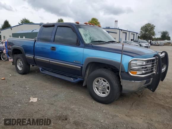 2000 Chevrolet Silverado 2500 LS с VIN 1GCGK29U5YE340513, выставлен на аукционе Copart как лот 71819774 с пробегом 71 990 миль миль и Списание • Salvage title. История ставок и продаж доступна на DreamBid. Изображение 4.