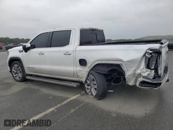 2023 GMC Sierra 1500 Denali z VIN 1GTUUGED8PZ115395, wystawiony jako Copart lot #71721435 z przebiegiem 46 201 mil mil oraz Szkoda całkowita • Salvage title. Historia ofert i sprzedaży dostępna na DreamBid. Obrazek 2.
