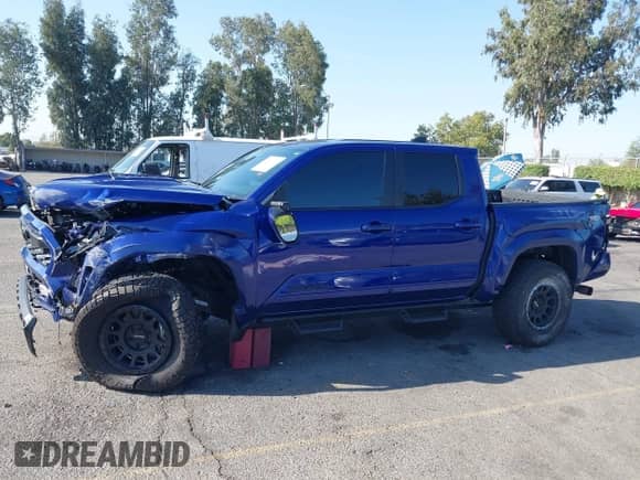 2024 Toyota Tacoma TRD Off Road with VIN 3TMLB5JN8RM074856, listed as a IAAI auction lot 43139396 with 8,137 mi miles and . Bid and sale history available at DreamBid. Image 14.
