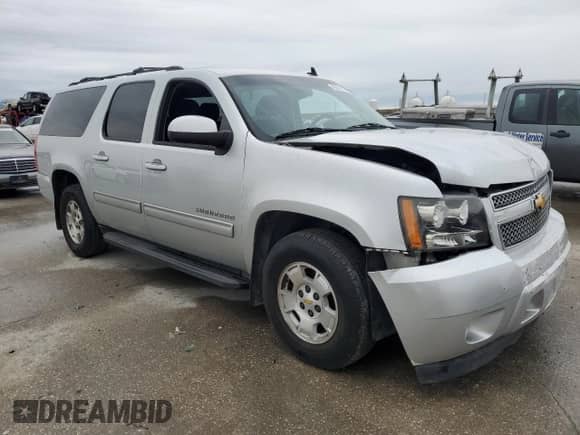 2013 Chevrolet Suburban LS с VIN 1GNSCHE02DR304642, выставлен на аукционе Copart как лот 43291035 с пробегом Не указан миль и Списание • Salvage title. История ставок и продаж доступна на DreamBid. Изображение 4.