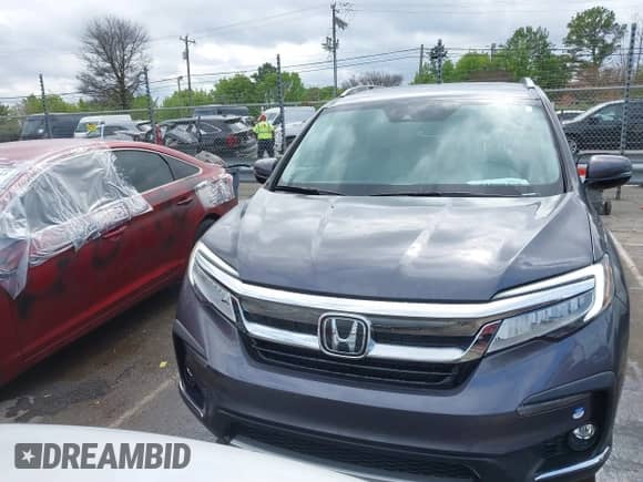 2022 Honda Pilot Touring 8-Passenger с VIN 5FNYF5H97NB014116, выставлен на аукционе IAAI как лот 41850438 с пробегом 11 859 миль миль и . История ставок и продаж доступна на DreamBid. Изображение 13.